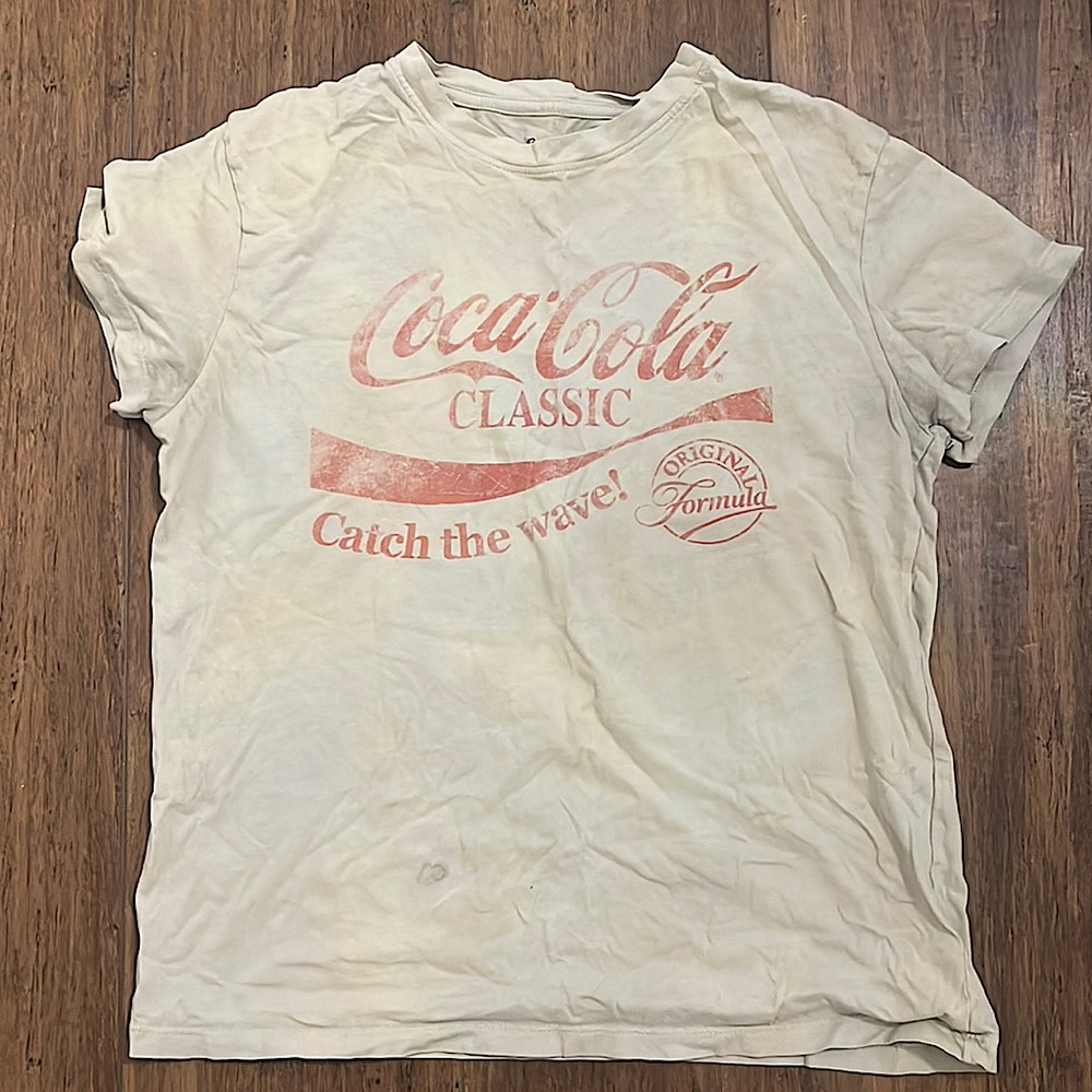 Tan Coca Cola shirt